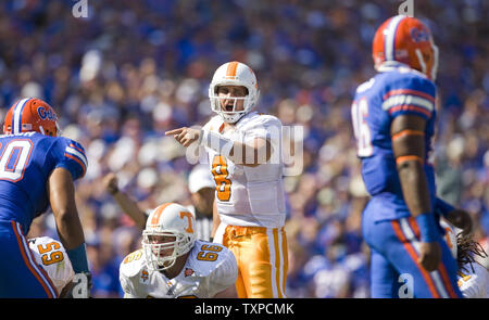 Gator running back Jeffery Demps (2) is brought down by Tennessee defenders  Jazen Jackson (L) and Eric Berry (R) in the first half of the NCAA football  game between the Tenessee Volunteers