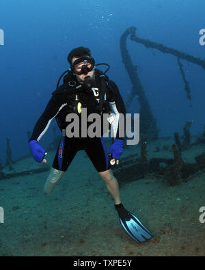 US Marine, Lance Corporal Tim Lang hovers over the Captain Dan Wreck off Pompano Beach, Florida on November 8, 2008. Lang is participating in the Soldiers Undertaking Disabled SCUBA (SUDS) Program. SUDS is offered at the Walter Reed Army Medical Center for the purpose of improving the lives and rehabilitating those soldiers wounded in the wars in Afghanistan or Iraq. (UPI Photo/Joe Marino - Bill Cantrell) Stock Photo