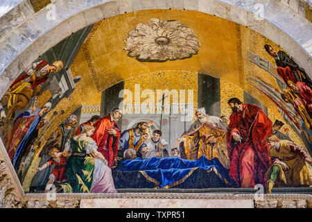 Detail from lavishly decorated main port of St Mark's Basilica, Venice Italy Stock Photo