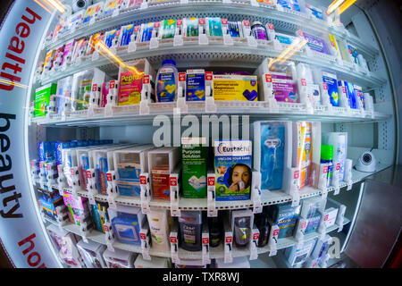 A CVS branded vending machine selling assorted sundries in the Union Square station in New York on Saturday, June 22, 2019. After an untold number of years since the removal of vending machines from subways a test of two CVS branding high-tech vending machines have been placed in the Union Square and Chamber Street stations. Currently 40% of the MTA retail spaces are unoccupied. (© Richard B. Levine) Stock Photo