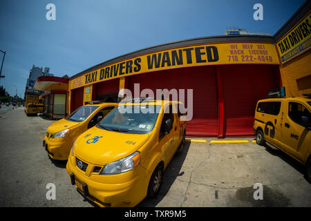 Unused taxis, without drivers, in a taxicab garage in the Park Slope neighborhood of Brooklyn in New York on Sunday, June 23, 2019. With the growth of ride sharing apps such as Lyft and Uber people are abandoning taxis as their preferred form of transportation causing the inflated prices of medallions to plummet. (© Richard B. Levine) Stock Photo