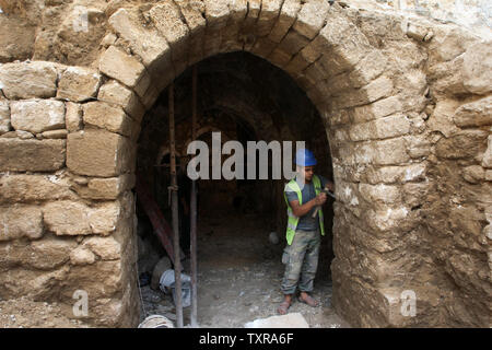 Palestinian workers renovate the archaeological site Maqam Al-Kader, which is one of the monuments of the city of Deir al-Balah, Gaza Strip, on March 27, 2016.  The Ministry of Tourism and Antiquities in the Gaza Strip started a renovation project funded by UNESCO, with the support of the Foundation Nawa. The restoration project is divided into two phases: the first maintenance of the walls of the place, domes and ceilings , and the second by converting it to a cultural library for children.       Photo by Ismael Mohamad/UPI Stock Photo