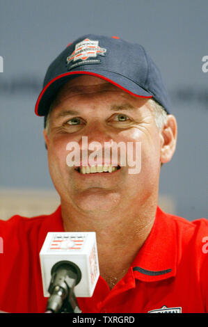 Former Chicago Cub Ryne Sandberg chuckles as he tells a story during a press conference at Cooperstown High School in Cooperstown, NY on July 30, 2005. Sandberg and former Boston Red Sox Wade Boggs, will be inducted into the Baseball Hall of Fame as the class of 2005 on July 31, 2005. (UPI Photo/Bill Greenblatt) Stock Photo