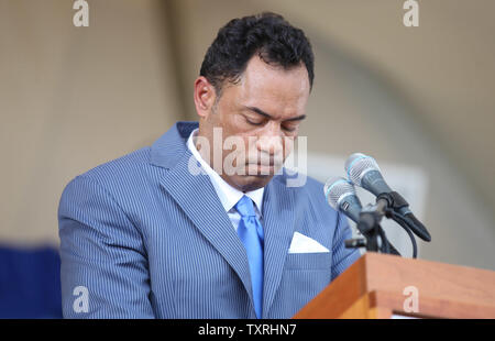Newly elected member to the National Baseball Hall of Fame Roberto Alomar makes an emotional pause as he delivers his remarks  during induction ceremonies in Cooperstown, New York on July 24, 2011.   UPI/Bill Greenblatt Stock Photo