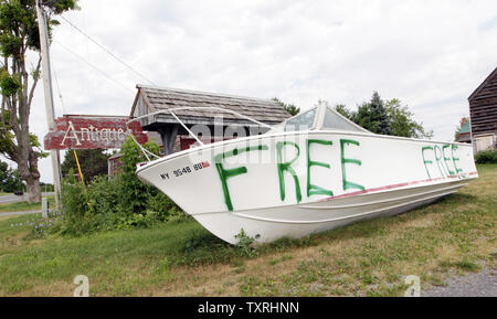 Owners of the Dutch Barn Antique Shop along Highway 20 in Carlisle, New York are advertising a free boat in front of their store on July 25, 2011. UPI/Bill Greenblatt