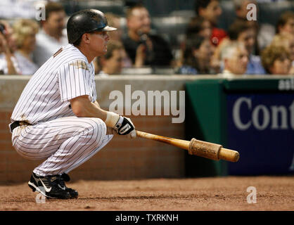 Houston Astros catcher Brad Ausmus returns to the dugout to go to bat  against the Washington Nationals at Osceola County Stadium in Kissimmee,  Florida, on March 7, 2007. (UPI Photo/Ed Wolfstein Stock