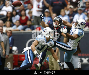 Houston Texans wide receiver Kevin Walter (83) is tackled by Arizona  Cardinals cornerback Dominique Rodgers-Cromartie during the second half of  an NFL football game Sunday, Oct. 11, 2009 in Glendale, Ariz.(AP Photo/Paul