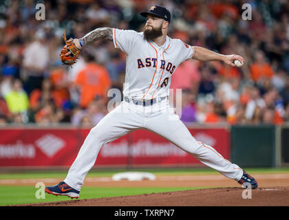 Houston Astros pitcher Dallas Keuchel throws against the Texas Rangers ...