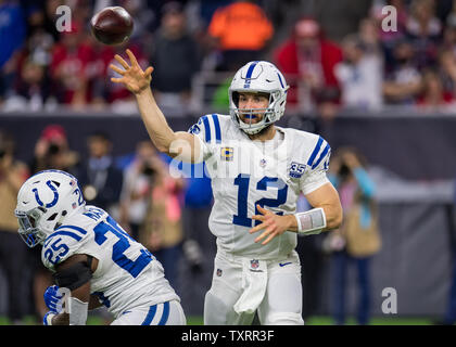 Indianapolis Colts quarterback Andrew Luck, left, talks with Kansas City  Chiefs wide receiver Jon Baldwin after an NFL football game Sunday, Dec.  23, 2012, in Kansas City, Mo. The Colts won 20-13. (