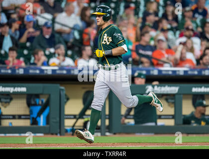 St. Petersburg, United States. 14th Apr, 2022. St. Petersburg, FL. USA;  Oakland Athletics center fielder Cristian Pache (20) and left fielder Chad  Pinder (10) chest bump during pregame warmups prior to a