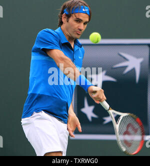 Roger Federer of Switzerland prepares to hit a shot during his mens semifinal match against Spaniard Rafael Nadal at the BNP Paribas Open in Indian Wells, California on March 17, 2012.  Federer defeated Nadal 6-3, 6-4 to advance to the finals.   UPI/David Silpa Stock Photo