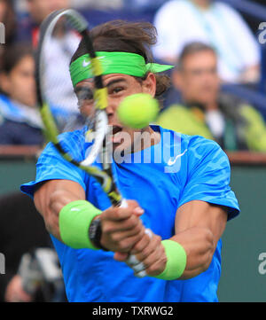 Spaniard Rafael Nadal prepares to hit a shot during his mens semifinal match against Roger Federer of Switzerland at the BNP Paribas Open in Indian Wells, California on March 17, 2012.  Federer defeated Nadal 6-3, 6-4 to advance to the finals.   UPI/David Silpa Stock Photo