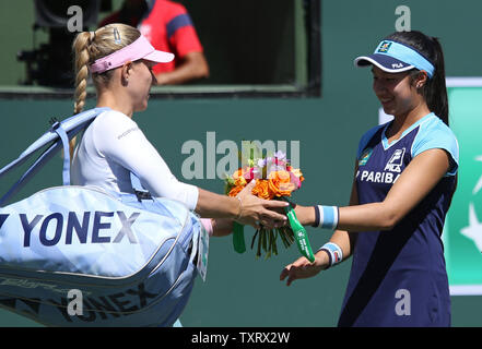 Angelique Kerber of Germany receives flowers as she enters the court before her women's final match against Bianca Andreescu of Canada at the BNP Paribas Open in Indian Wells, California on March 17, 2019.   Photo by David Silpa/UPI Stock Photo