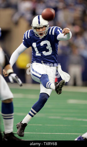 Kicker Mike Vanderjagt, of the Indianapolis Colts, embraces kicker Adam  Vinatieri, of the New England Patriots, following the Patriots victory over  the Colts, in the AFC Championship Game, Sunday, January 18, 2004