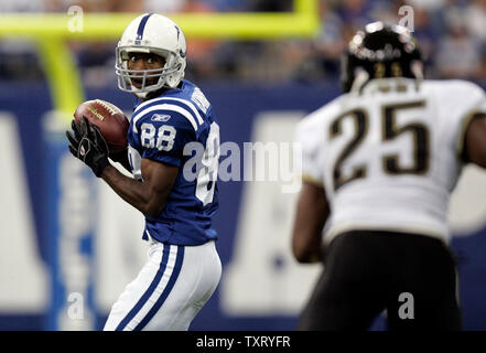 Indianapolis Colts wide receiver Marvin Harrison (88) outruns Detroit Lions  cornerback Leigh Bodden (28) during the fourth quarter at Lucas Oil Field  in Indianapolis on December 14, 2008. The 16-yard catch was