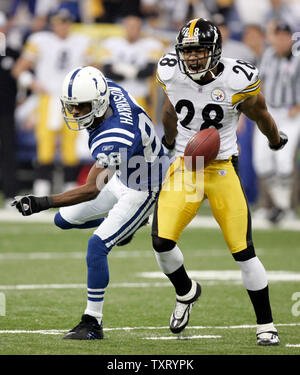 Indianapolis Colts wide receiver Marvin Harrison (88) outruns Detroit Lions  cornerback Leigh Bodden (28) during the fourth quarter at Lucas Oil Field  in Indianapolis on December 14, 2008. The 16-yard catch was