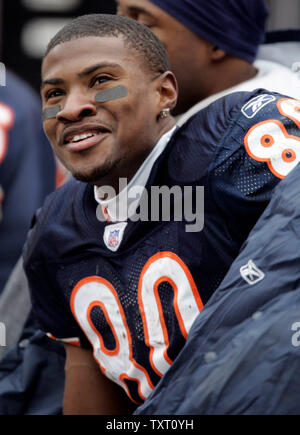 Chicago Bears wide receiver Bernard Berrian, left, catches a 40-yard pass  for a touchdown as Seattle Seahawks' Kelly Herndon, center, and Oliver  Celestin, right, defend during the third quarter of an NFL