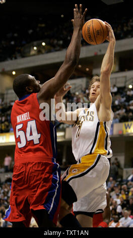 Indiana Pacers guard Mike Dunleavy (R) goes up for a basket against Detroit Pistons forward Jason Maxiell (54) at Conseco Fieldhouse in Indianapolis April 3, 2007. Detroit defeated the Pacers 100-85. (UPI Photo/Mark Cowan) Stock Photo