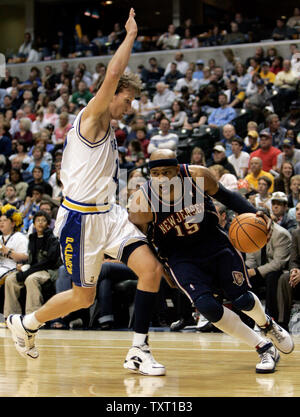 New Jersey Nets guard Vince Carter (15) drives around Indiana Pacers guard Mike Dunleavy (L) at Conseco Fieldhouse in Indianapolis April 15, 2007. The Nets defeated the Pacers 111-107 pushing them to the brink of elimination from the playoffs.  (UPI Photo/Mark Cowan) Stock Photo