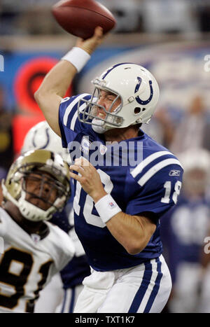 Indianapolis Colts quarterback Peyton Manning  (18) passes before being sacked by New Orleans Saints defensive end Will Smith (91) sacks him at the RCA Dome in Indianapolis on September 6, 2007. The Colts defeated the Saints 41-10. (UPI Photo/Mark Cowan) Stock Photo