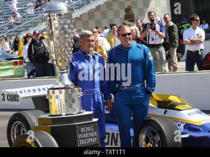 4 time Indy 500 winner Al Unser Sr, and his son 2 time Indy 500 winner Al Unser Jr, pose with the Borg Warner Trophy during Unser Day opening ceremonies on May 4, 2008 at the Indianapolis Motor Speedway in Indianapolis, Indiana. (UPI Photo/ Bill Coons) Stock Photo