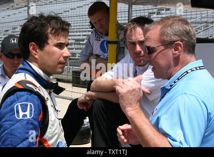 Rookie Enrique Bernoldi listens to two time Indy 500 winner Al Unser Jr. describe how to drive the track on May 5, 2008 at the Indianapolis Motor Speedway in Indianapolis, Indiana. (UPI Photo/Ed Locke) Stock Photo