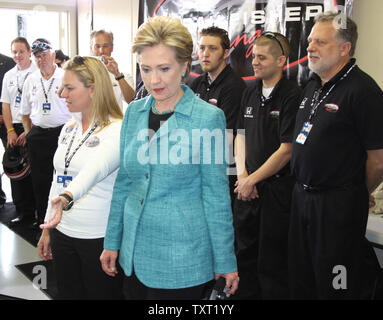 Indy 500 driver Sarah Fisher describes her car to Hillary Clinton on May 6, 2008 at the Indianapolis Motor Speedway in Indianapolis, Indiana. (UPI Photo/ Bill Coons) Stock Photo