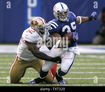 Indianapolis Colts running back Chad Simpson (35) is brought down by San Francisco 49ers linebacker Patrick Lewis (52) during the second quarter at Lucas Oil Field in Indianapolis on November 1, 2009. UPI /Mark Cowan Stock Photo
