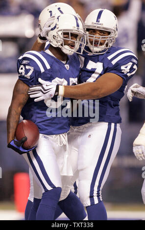 Indianapolis Colts wide receiver Reggie Wayne (87) celebrates his second quarter touchdown against the New England Patriots with teammate Gijon Robinson (47) at Lucas Oil Field in Indianapolis on November 15, 2009.  UPI /Mark Cowan Stock Photo