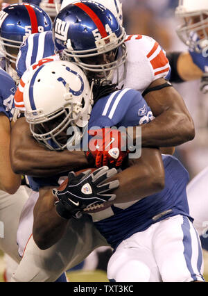 New York Giants linebacker Jonathan Goff (54) hits Chicago Bears  quarterback Todd Collins (10) as Collins passes during second half NFL  action in the New York Giants' 17-3 victory over the Chicago