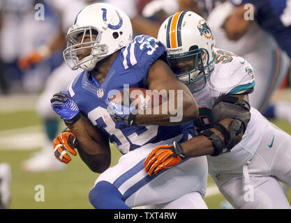 Indianapolis Colts running back Vick Ballard (33) is hit by Miami Dolphins linebacker Karlos Dansby (58) after a 3-yard gain during the fourth quarter at Lucas Oil Stadium in Indianapolis, IN., November 4, 2012. The Colts defeated the Dolphins 23-20.  UPI /Mark Cowan Stock Photo