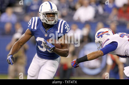 Indianapolis Colts running back Vick Ballard (33) escapes Buffalo Bills safety George Wilson (37) during the third quarter of their 20-13 win at Lucas Oil Stadium in Indianapolis, IN., November 25, 2012.  UPI /Mark Cowan Stock Photo