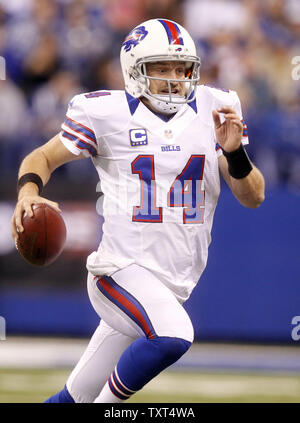 Buffalo Bills quarterback Ryan Fitzpatrick (14) scrambles for a 6-yard gain during the fourth quarter of their 20-13 loss to the Indianapolis Colts at Lucas Oil Stadium in Indianapolis, IN., November 25, 2012.  UPI /Mark Cowan Stock Photo