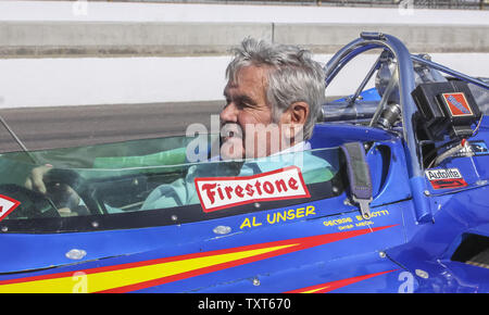 Four time Indy 500 winner Al Unser sits in the cockpit of a vintage race car during a parade lap on Legends Day of Indianapolis 500 at the Indianapolis Motor Speedway  on May 23, 2015 in Indianapolis, Indiana.      Photo by Mike Gentry/UPI Stock Photo