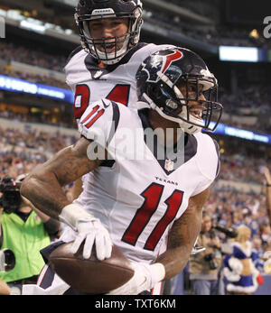 Houston Texans wide receiver John Metchie III (88) catches a pass and  breaks away for a firs down in the third quarter of the NFL Football Game  between the Los Angeles Chargers