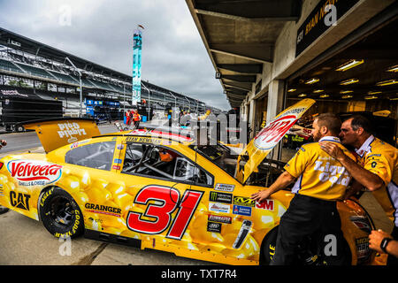 With rain in the area, the crew for Ryan Newman work to prepare his car for the 2017 Brantley Gilbert Big Machine Brickyard 400, at the Indianapolis Motor Speedway on July 23, 2017 in Indianapolis, Indiana.      Photo by Edwin Locke/UPI Stock Photo