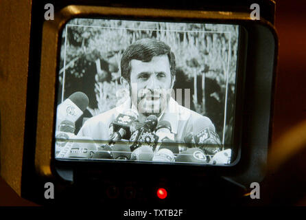 Iran's president Mahmoud Ahmadinejad is seen in a frame of camera during a press conference in Tehran, Iran on January 14, 2006. Iran will not be deflected from its right to develop nuclear technology by referral to the UN Security Council for possible sanctions, Iranian President Mahmoud Ahmadinejad said on Saturday. (UPI Photo/Mohammad Kheirkhah) Stock Photo