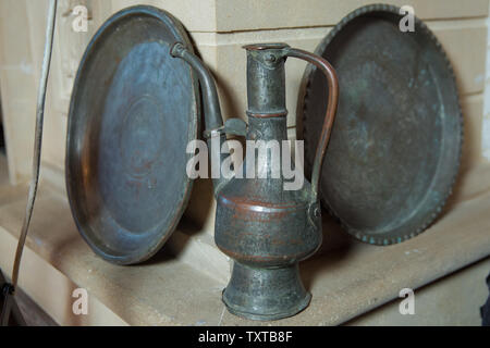 ld copper pots . Aftafa. Basically, household items used for washing and hand washing. old copper container . Stock Photo