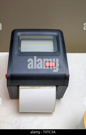 Small Barcode Label Printer Equipment for Distribution Warehouse Stock Photo