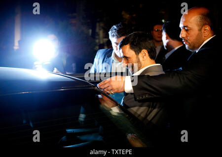 Iran's President Mahmoud Ahmadinejad (C) enters his car after a departure ceremony for Russian President Vladimir Putin in Tehran, Iran on October 16, 2007. (UPI Photo/Mohammad Kheirkhah). Stock Photo