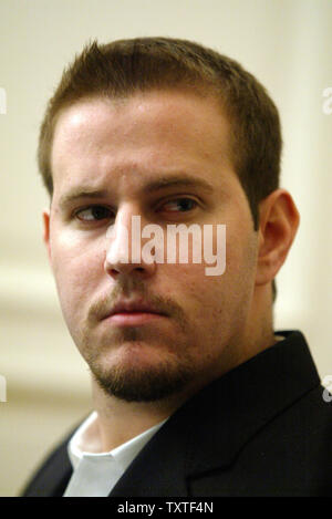 Daniel, son of Christine Levinson (not shown), wife of ex-FBI agent Robert Levinson who disappeared in Iran in March 2007, listens during a press conference at the  Swiss embassy in Tehran, Iran on December 22, 2007. Robert Levinson went missing while on a business trip to Iran's southern island of Kish and the Iranian government claims they have no information on his whereabouts. (UPI Photo/Mohammad Kheirkhah) Stock Photo