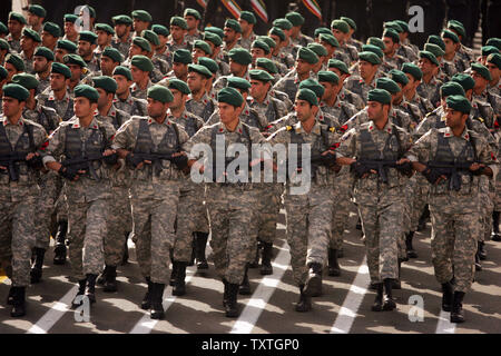 Iranian Army soldiers march during Iran's Army Day at the mausoleum of the late revolutionary founder Ayatollah Ruhollah Khomeini, just outside Tehran, Iran on April 18, 2009. (UPI Photo/Mohammad Kheirkhah) Stock Photo