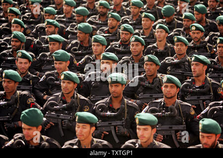 Iranian Army soldiers march during Iran's Army Day at the mausoleum of the late revolutionary founder Ayatollah Ruhollah Khomeini, just outside Tehran, Iran on April 18, 2009. (UPI Photo/Mohammad Kheirkhah) Stock Photo