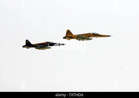 Iranian F5 jet fighters fly during a large maneuver at Sea of Oman in ...