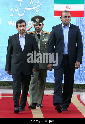 Iranian President Mahmoud Ahmadinejad greets President of Guyana Bharrat Jagdes during welcome ceremony at the Presidential place  in Tehran, Iran, on January 20, 2010.     UPI/Maryam Rahmanian Stock Photo
