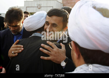 Iranian President Mahmoud Ahmadinejad greets supporters as he arrives at Tehran’s Mehrabad Airport on May 5, 2010, after his trip to the United States to attend the Nuclear Non-Proliferation Treaty Review Conference at United Nations Headquarters in New York. UPI/Maryam Rahmanian Stock Photo