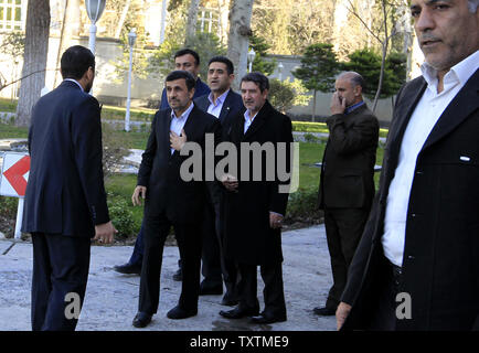 Iranian President Mahmoud Ahmadinejad (2nd-L) walks into presidential palace prior to a welcome ceremony for Pakistan President Asif Ali Zardari in Tehran, Iran on February 27, 2013.    UPI/Maryam Rahmanian Stock Photo