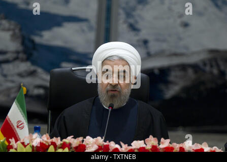 Iran's President Hassan Rouhani speaks during the 21st Foreign Ministerial Meeting of the Economic Cooperation Organization (ECO) on November 26, 2013 in Tehran, Iran. The meeting focused on enhancing cooperation among the member countries in the economic, technical, and cultural fields. UPI/Maryam Rahmanian Stock Photo