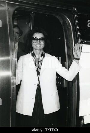 Jacqueline Kennedy Onassis boards the Landmark Express at Penn Station in New York on April 16, 1978. She is riding the train to Washington DC to bring support for the historical landmark designation of Grand Central Station. UPI Stock Photo