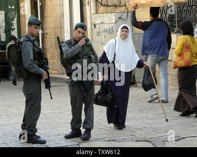 Israeli border police patrol in the Muslim Quarter in the Old City of Jerusalem, November 10, 2008. Jerusalem residents will elect a new mayor tomorrow to head Jerusalem, the Holy City for three major religions.  The mayoral candidates include  Nir Barkat, a secular high tech investor, Arkadi Gaydamak, a Russian billionaire and an Ultra-Orthodox Rabbi Meir Porush. (UPI Photo/Debbie Hill) Stock Photo